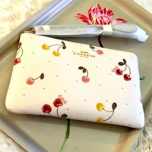 New! Coach large wristlet in ivory w/cherries
